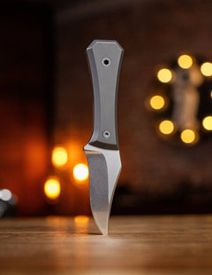AUX MFG Ti Pocket Bowie Fixed Blade by BIG IDEA DESIGN LLC with a sleek titanium handle