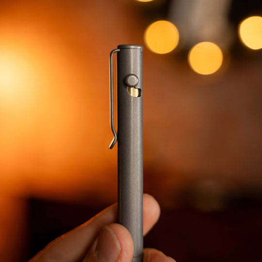 edc-bolt-action-pen-held-hand-
