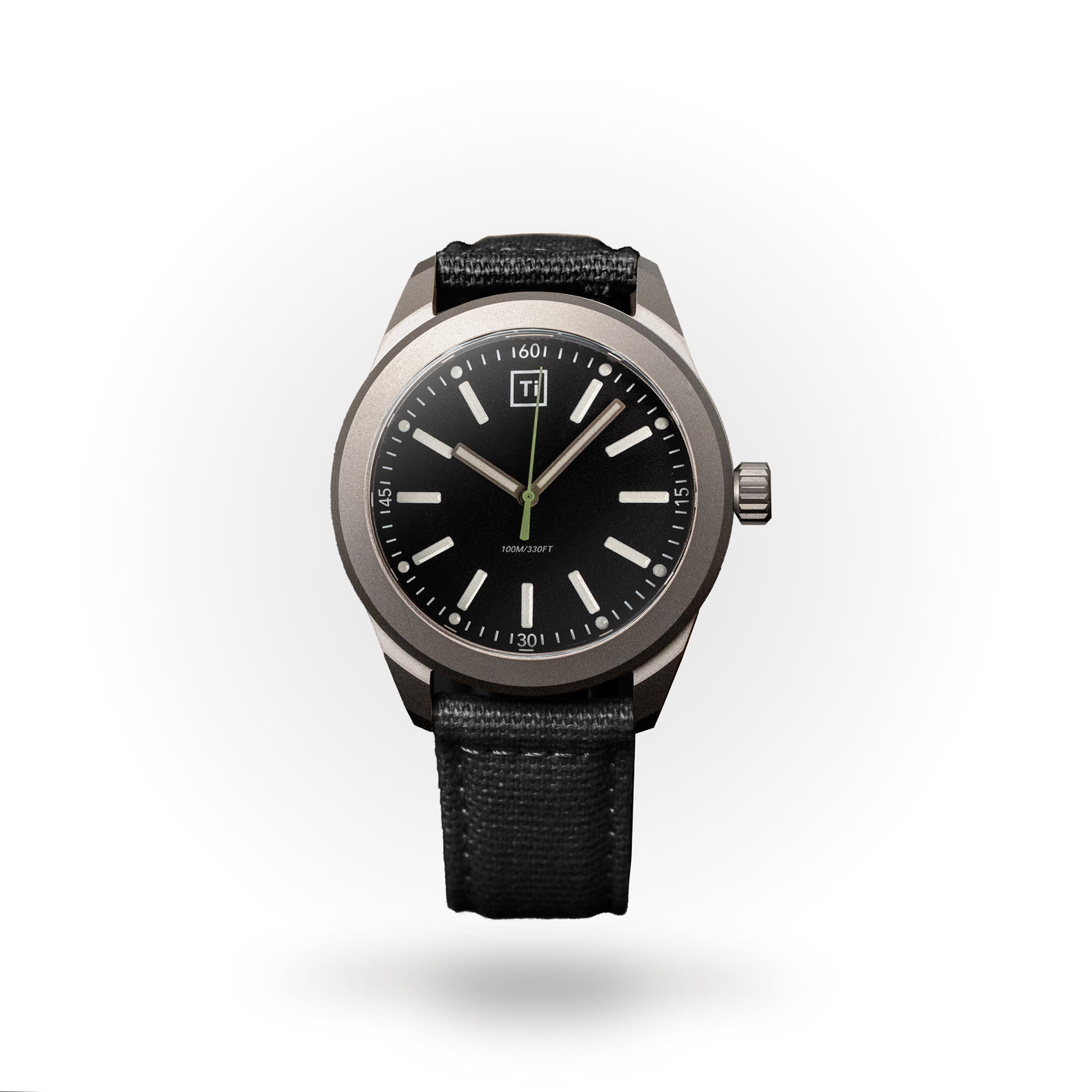 Big Idea Design LLC titanium field watch with black dial luminous hands and black canvas strap