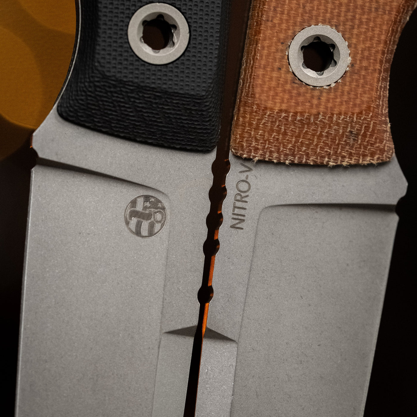 BIGiDESIGN-USA fixed blad knives with textured black and brown handles and serrated blade edges