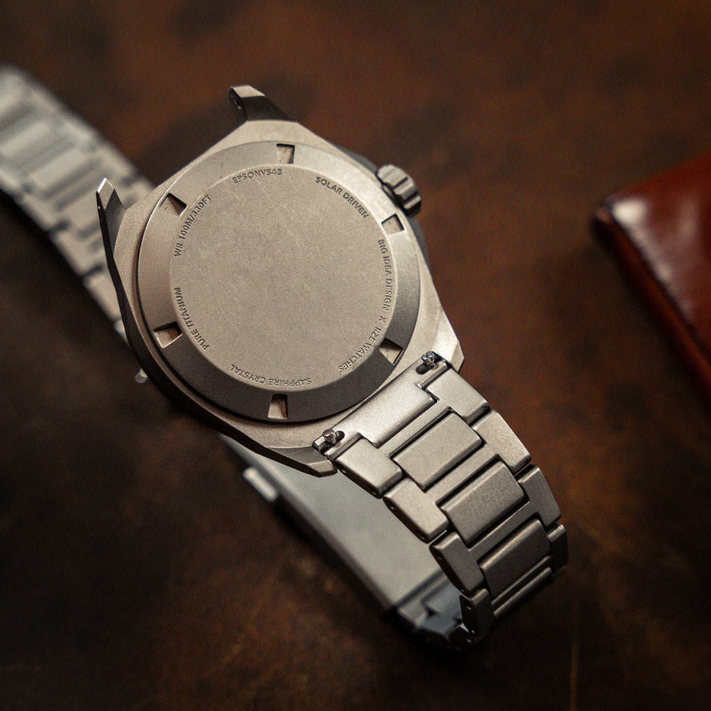 Close-up of premium titanium bracelet watch band by BIG IDEA DESIGN LLC with a sleek metallic finish