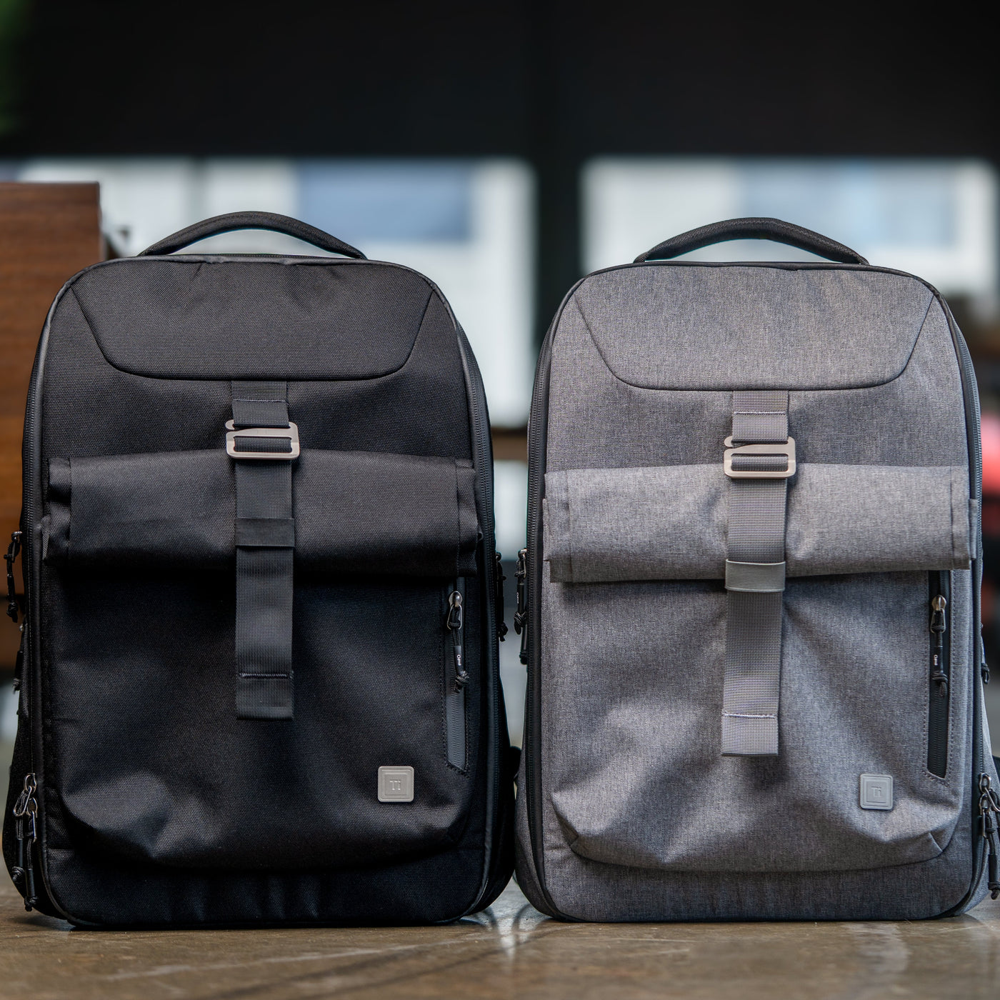 Big Idea Design LLC everyday carry backpack in black and gray with front buckle and side pockets