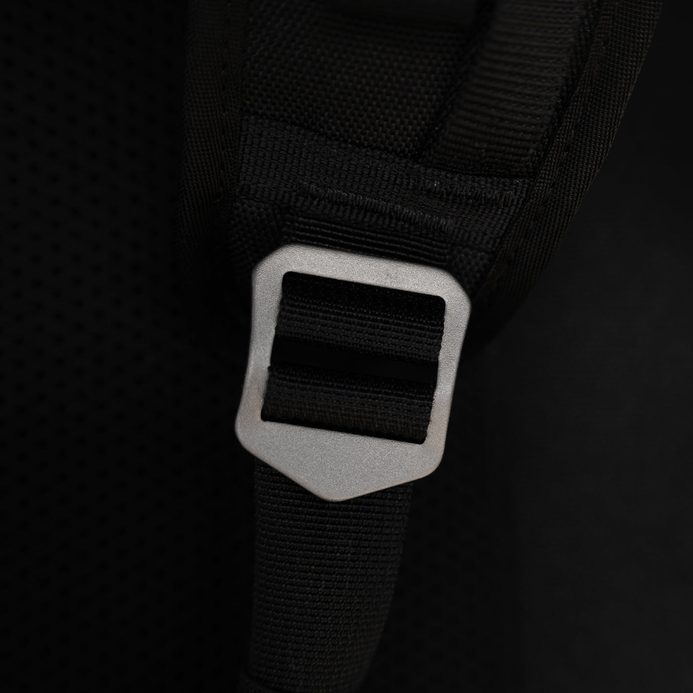 Close-up of black strap buckle on Big Idea Design LLC everyday carry backpack