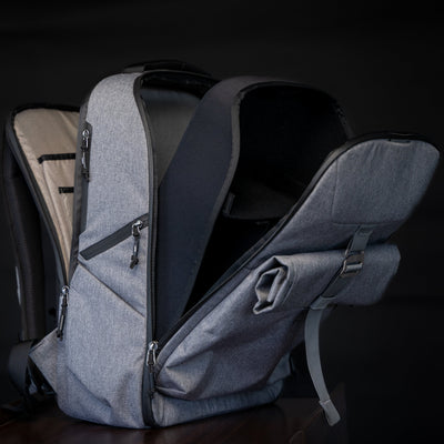 Big Idea Design LLC gray everyday carry backpack with multiple compartments open showing interior
