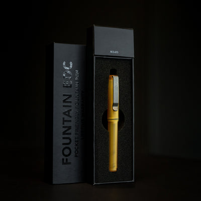 USA made EDC pen by BIGiDESIGN-USA in gold color with pocket-friendly fountain pen design in black packaging