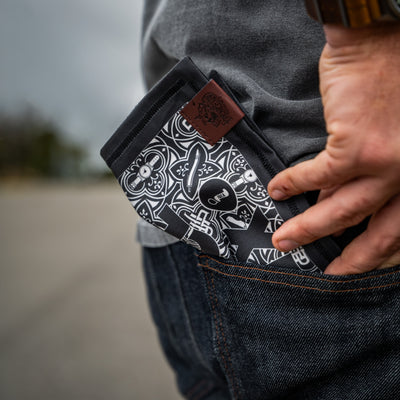 Write Slice Fix Hank accessory with black and white patterned design held in back pocket