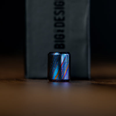 Big Idea Design LLC Damascus lanyard bead with blue and black patterned metal finish