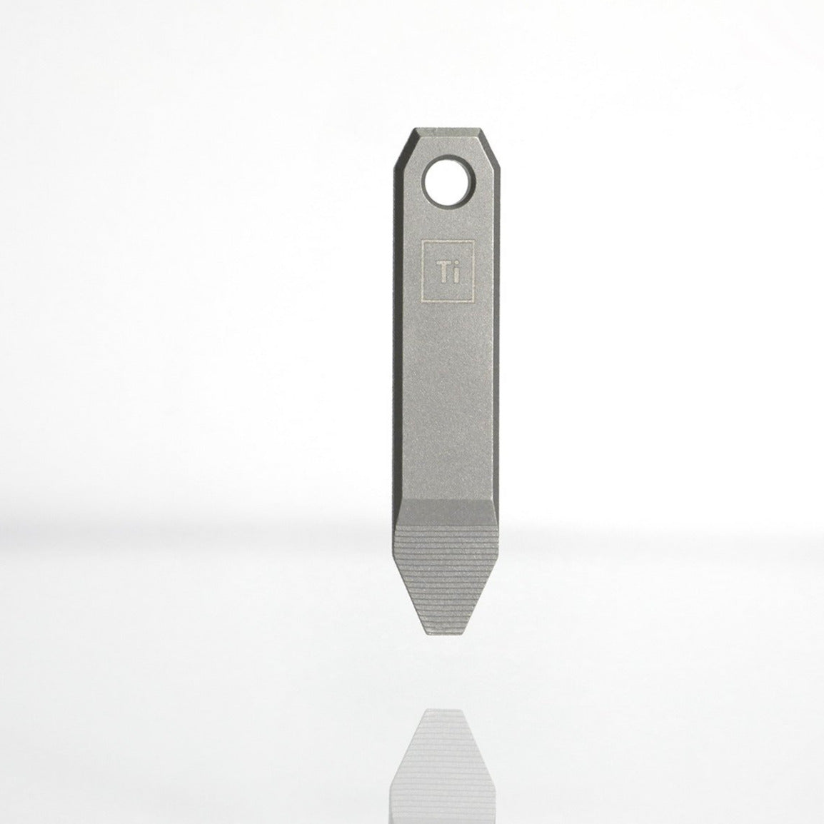 Mini Titanium Pry Bar EDC tool by BIG IDEA DESIGN LLC with compact and durable metal design