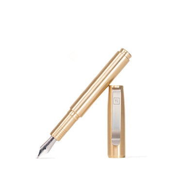 Big Idea Design LLC gold fountain pen for EDC enthusiasts with sleek metal body and removable cap