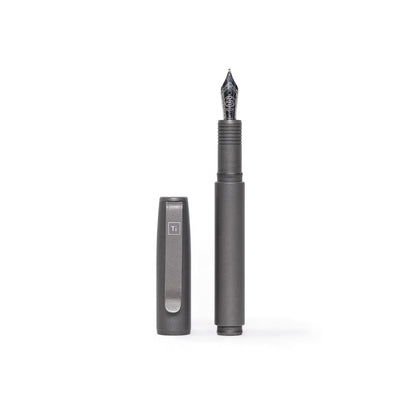Big Idea Design LLC sleek black fountain pen for EDC enthusiasts with cap beside the pen
