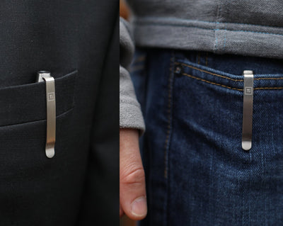 Titanium Fountain Pen by Big Idea Design LLC clipped to a suit pocket and blue jeans pocket
