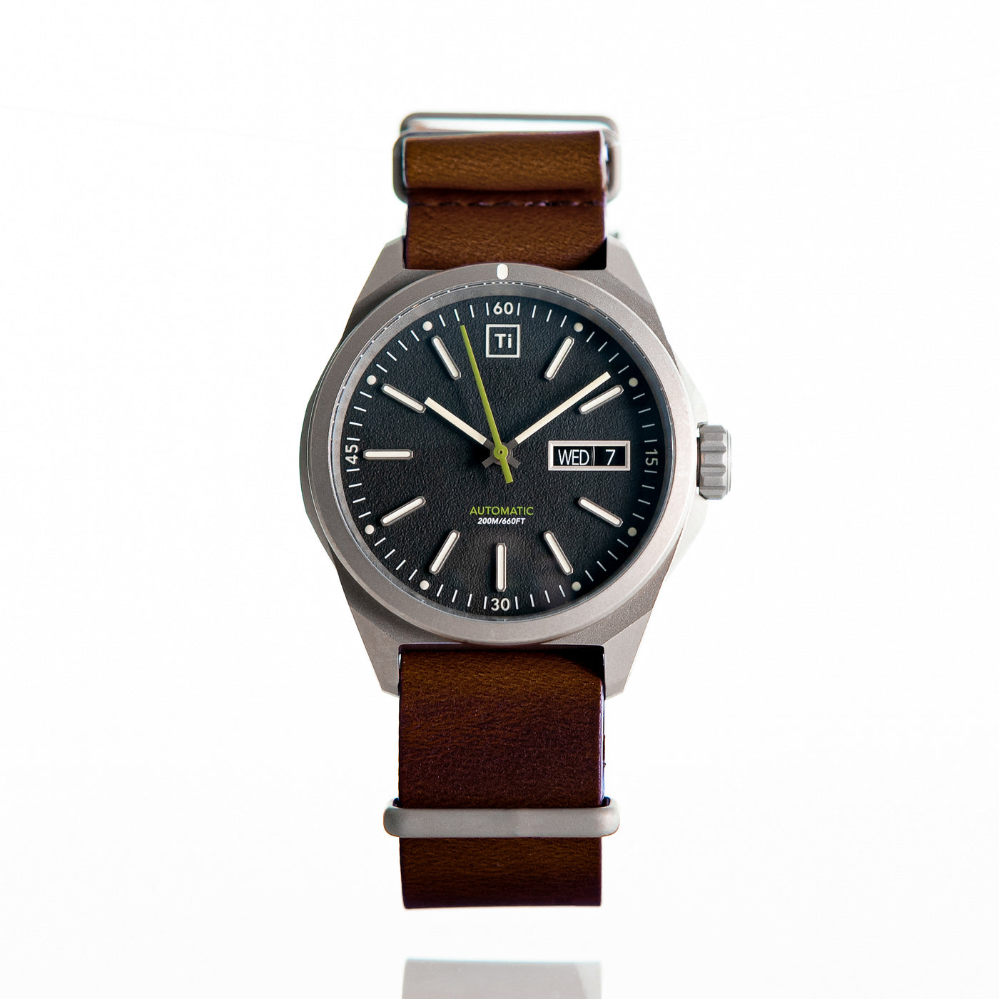 Big Idea Design LLC titanium automatic field watch with black dial and brown leather strap