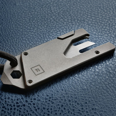 BIG IDEA DESIGN LLC Titanium Pocket Tool EDC with multi-function design and compact form on textured surface
